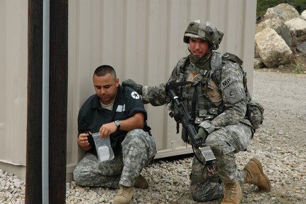 A Massachusetts Army National Guard Soldier trains in urban warfare techniques at the Military Operations on Urban Terrain Site at Camp Edwards in Massachusetts. The MOUT site is one of the new facilities at the Cape Cod post.