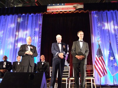 Thomas F. Hall, assistant secretary of defense for reserve affairs; Air Force Lt. Gen. Craig R. McKinley, director of the Air National Guard; and David S.C. Chu, undersecretary of defense for personnel and readiness, prepare to present the Secretary of Defense Employer Support Freedom Award at the Employer Support of Guard and Reserve ceremony Sept. 18, 2008, in Washington, D.C.