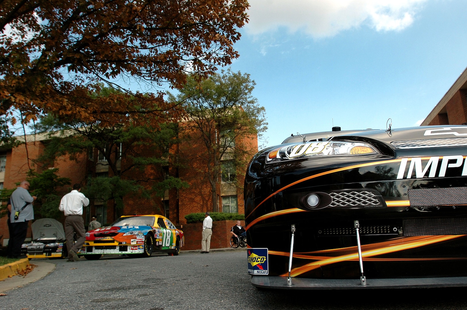 NASCAR racecars sit on display at Walter Reed Army Medical Center in Washington, Thursday, Sept. 18, 2008. Several cars were on display as drivers met with troops in the hospital and signed autographs.