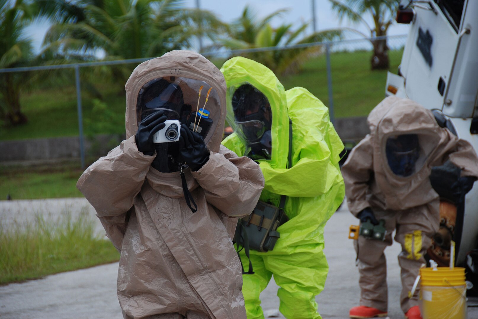 Members of the Guam National Guard's 94th Weapons of Mass Destruction, Civil Support Team (CST) assess a simulated suspected terrorist crime scene at a vacant high school near Tumon Bay, Guam Sept. 17 as part of the National Guard Bureau sponsored exercise Vigilant Guard. Vigilant Guard is a multi-day homeland defense exercise designed to enhance the Guard's and other agencies' capabilities and abilities to join in an emergency.