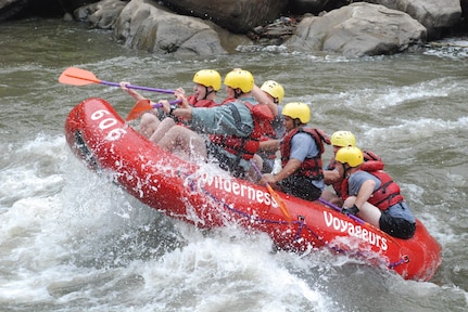 Virginia National Guard Soldiers from the 3rd Battalion, 116th Brigade Combat Team travel down the Youghiogheny River in Pennsylvania Sept. 13. The Soldiers were particpating in Warrior Adventure Quest, an Army pilot program designed to curb high-risk behavior in redeploying Soldiers by giving them an outlet through high-adventure activities.