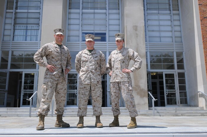 From left, Warrant Officer Andrew DuRivage, Warrant Officer Christopher Johnson and Warrant Officer Crystal Black stand before Little Hall, where they graduated The Basic School’s Warrant Officer Basic Course on May 22. 
