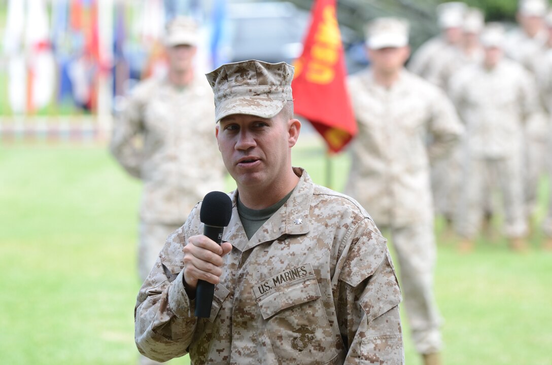 MARINE CORPS BASE HAWAII - Lt. Col. Michael Roach, commanding officer of 1st Battalion, 12th Marine Regiment, addresses guests at the deactivation ceremony for Echo Battery, 2nd Battalion, 12th Marine Regiment, at Dewey Square, May 21, 2013. (U.S. Marine Corps photo by Kristen Wong)