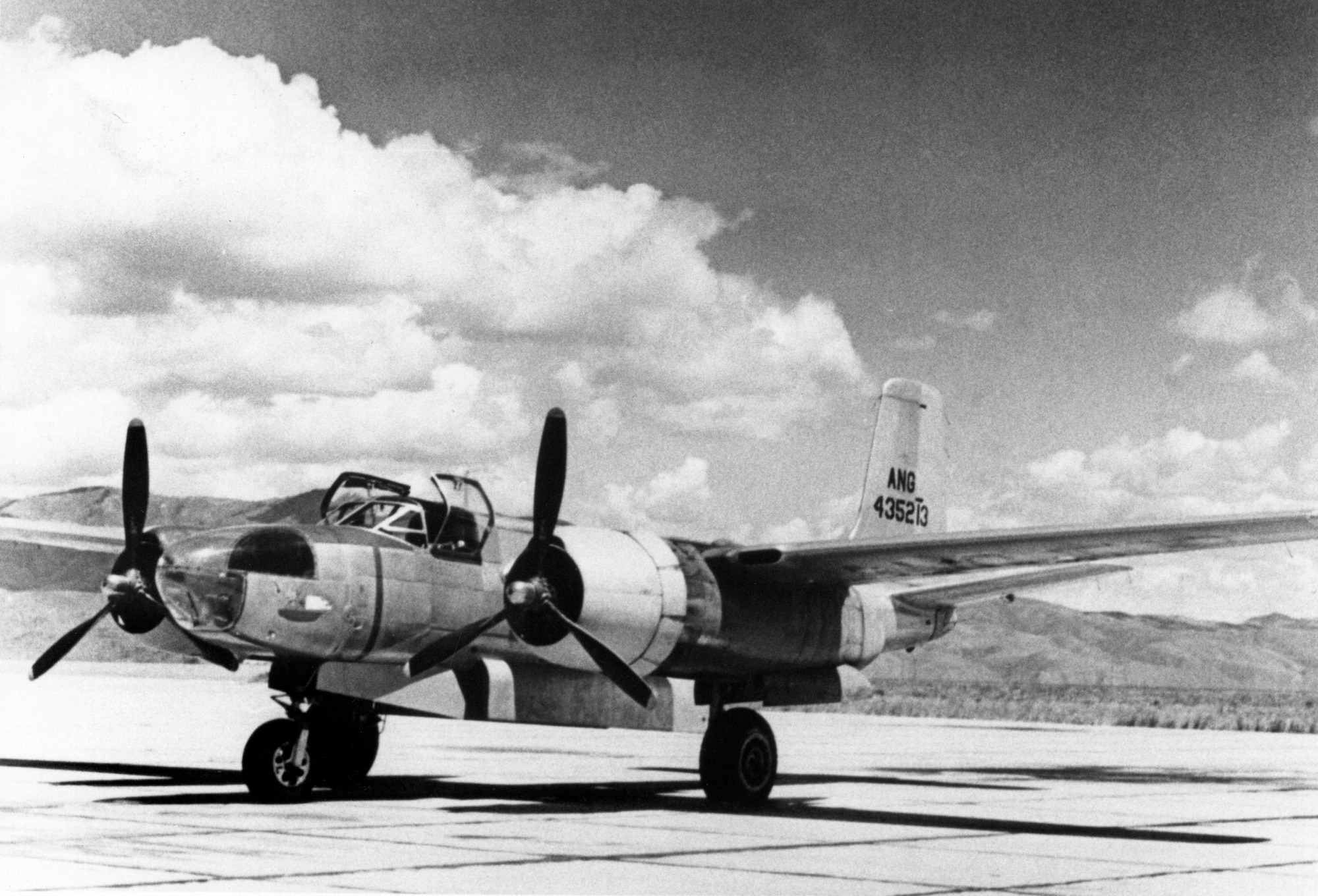 This Douglas A-26C-30-DT Invader, serial number 44-35213, was one of several examples of the type assigned to the Oregon Air National Guard (OreANG) in the late 1940's.  It was similar to the OreANG A-26B-40-DL, serial number 41-39526, lost on April 9, 1948.  The A-26 bombers (designated B-26 in June, 1948) were used by the OreANG in a utility role.  For example, this A-26C, possibly pictured at Gowen Field, Idaho during OreANG summer training in 1950, towed aerial targets for the 142d Fighter Group’s P-51D Mustang fighter pilots to practice their aerial gunnery skills on.  (Image from the 142nd Fighter Wing History Archives)