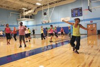 More than 30 patrons performed three hours of ceaseless Zumba during the Zumba Jam celebrating May Fitness Month at the Chaparral Fitness Center May 18. (Air Force photo by Robbin Cresswell)
