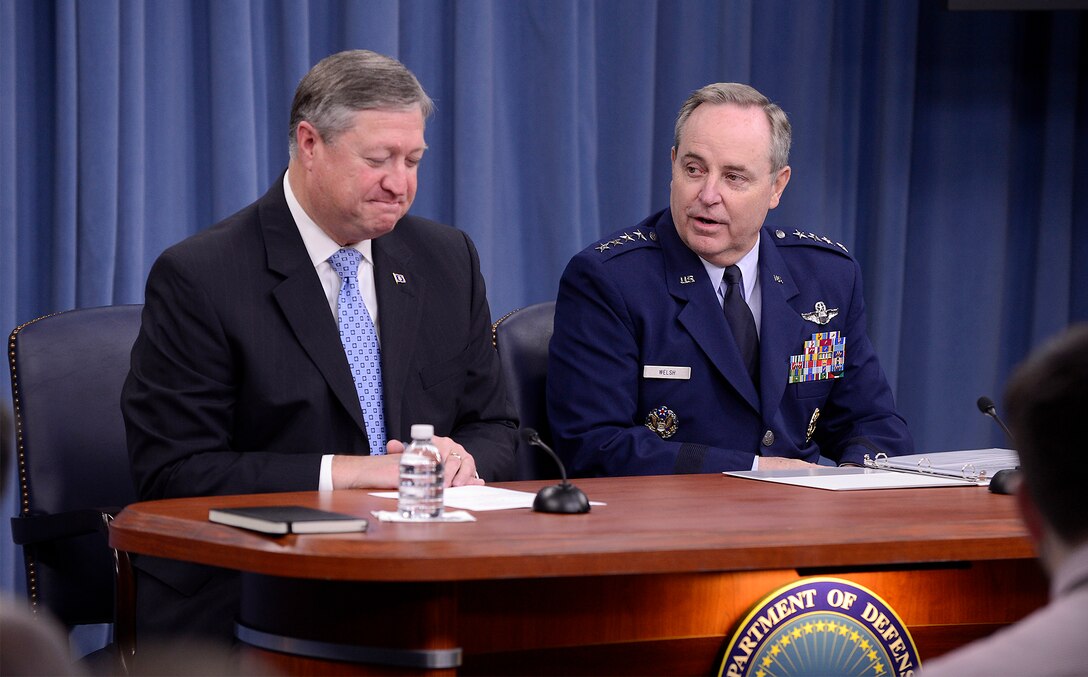 Secretary of the Air Force Michael Donley and Air Force Chief of Staff Gen. Mark A. Welsh III field questions from members of the Pentagon press corps  at the Pentagon, May 24, 2013.  During the press briefing, Welsh thanked Donley and his wife, Gail, for their leadership and humble service to the nation.  Donley will step down from his position June 21, after serving more than five years as secretary of the Air Force.  (U.S. Air Force photo/Scott M. Ash)