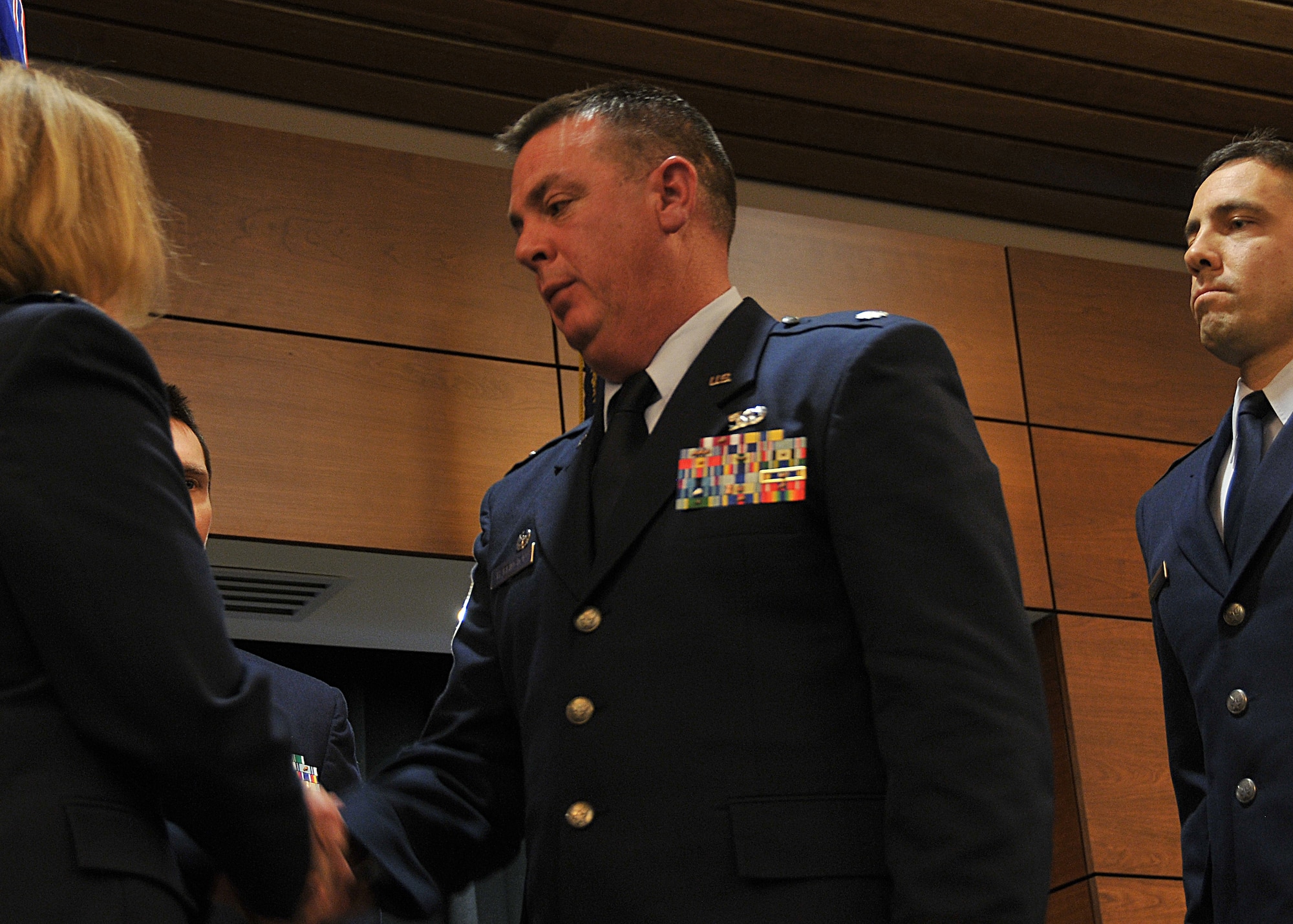 JOINT BASE ELMENDORF-RICHARDSON -- Lt. Col.John Harrington relinquishes command of the 176 Logistics Readiness Squadron here May 18, 2013. National Guard photo by Staff Sgt. N. Alicia Goldberger.
