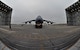 Troops from the 439th Maintenance Squadron prepare to tow a C-5 Galaxy into Westover's Regional Isochronal dock, May 22, 2013, to test the newly-constructed mobile tail enclosure. Crews broke ground April 1, 2012, for the $5 million MTE, is a moveable structure on rails that will protect maintenance troops from harsh New England weather. The MTE is the largest structure of its kind in the Air Force. (U.S. Air Force photo/SrA Kelly Galloway)