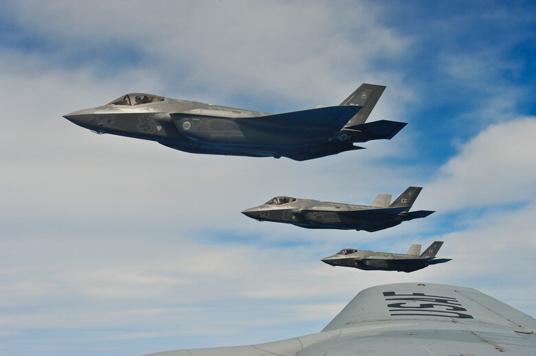F-35A Lightning IIs perform an aerial refueling mission with a KC-135 Stratotanker May 13, 2013, off the coast of northwest Florida. The 33rd Fighter Wing at Eglin Air Force Base, Fla., is a joint graduate flying and maintenance training wing that trains Air Force, Marine, Navy and international partner operators and maintainers of the F-35 Lightning II. The F-35As are assigned to the 58th Fighter Squadron, 33rd FW. The KC-135 is assigned to from the 336th Air Refueling Squadron from March ARB, Calif. (U.S. Air Force photo/Master Sgt. Donald R. Allen)