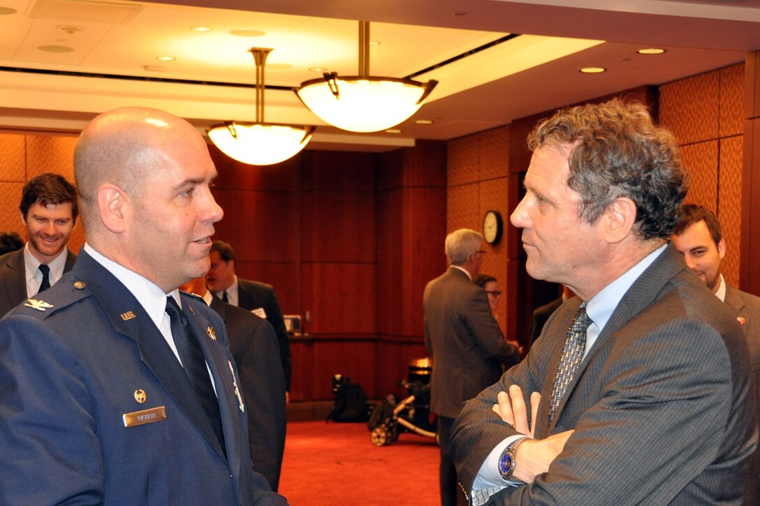 Air Force Reserve Col. James Dignan (right), commander of the 910th Airlift Wing, based at Youngstown Air Reserve Station (YARS), Ohio talks with Ohio Senator Sherrod Brown at a morning coffee in the U.S. Capitol Visitor’s Center here, May 15, 2013. Col. Dignan later visited the senator’s office to discuss the 910th’s mission as well as several issues concerning the unit and installation as part of the commander’s Air Force Reserve Capitol Hill Visit program, May 15 and 16, 2013. The primary purpose of the program is to assist commanders in improving and building on relationships established with Congressional delegations and to increase their unit’s visibility with members of Congress. U.S. Air Force photo by Master Sgt. Bob Barko Jr.