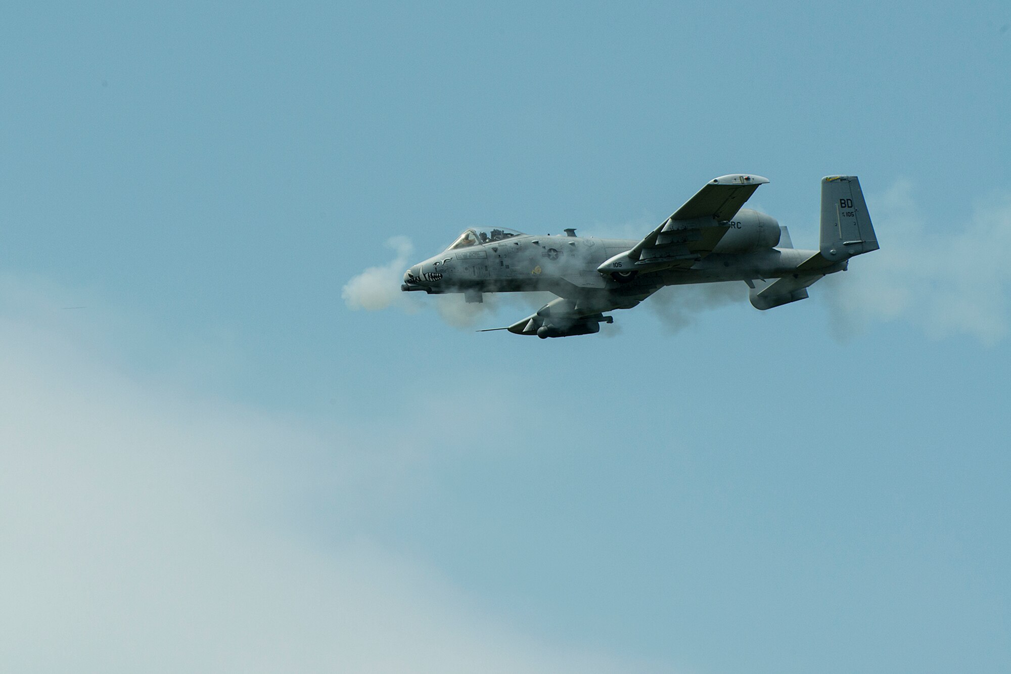 An A-10 Thunderbolt II assigned to the 917th Fighter Group (FG) fires its 30 millimeter GAU-8 Gatling gun over the Claiborne Bombing and Gunnery Range, May 22, 2013, Kisatchie National Forest, La. During this sortie, four A-10s fired the last remaining ammunition allotted to the FG in preparation for its inactivation in September 2013. (U.S. Air Force photo by Master Sgt. Greg Steele/Released)
