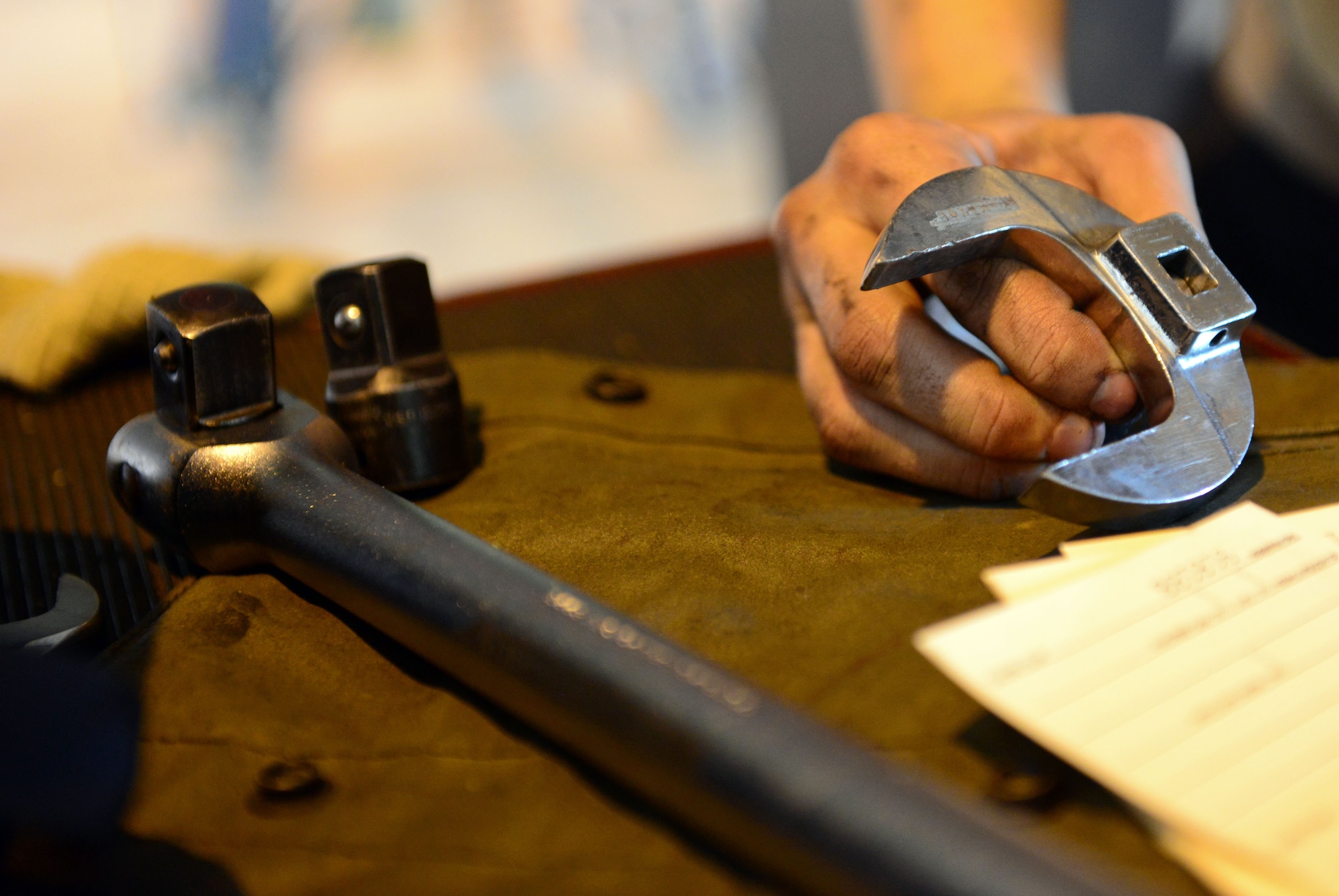 Staff Sgt. AnnMarie Ringer, 510th Aircraft Maintenance Unit dedicated crew chief, holds a tool May 14, 2013, at Aviano Air Base, Italy. Crew chiefs are responsible for all parts of the aircraft and they must adjust and align components, inspect and prevent aircraft corrosion and diagnose and solve aircraft maintenance problems daily. (U.S. Air Force photo/Airman 1st Class Matthew Lotz)