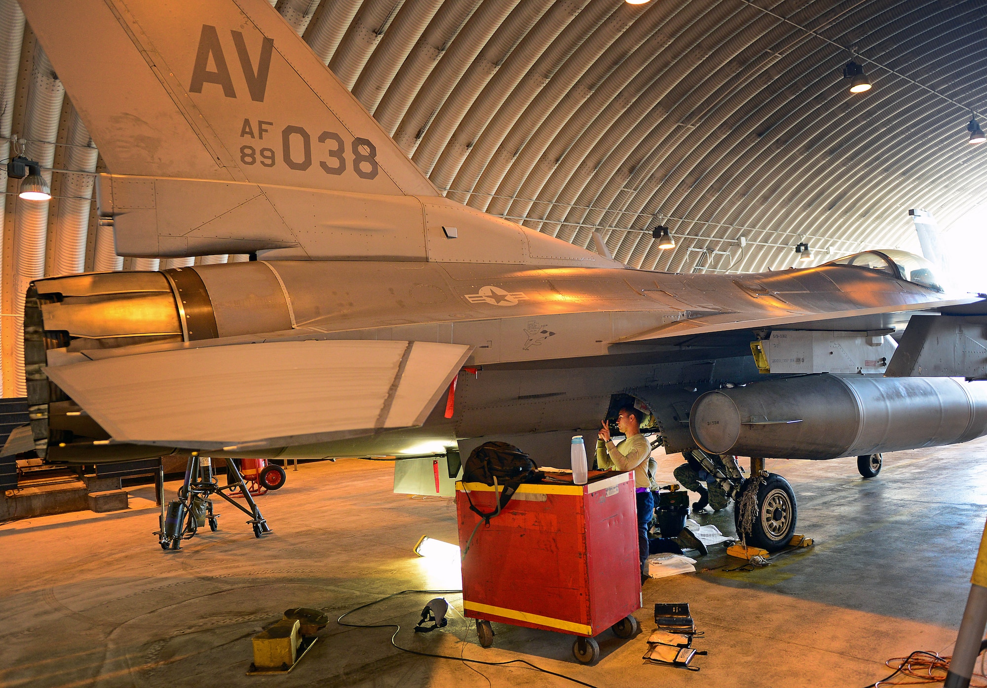 Staff Sgt. AnnMarie Ringer, 510th Aircraft Maintenance Unit dedicated crew chief, looks under an F-16 Fighting Falcon May 14, 2013, at Aviano Air Base, Italy. The 510th AMU is part of the 31st Aircraft Maintenance Squadron, which is responsible for maintaining 31st Fighter Wing aircraft to support U.S. Air Forces in Europe and NATO operations. (U.S. Air Force photo/Airman 1st Class Matthew Lotz)