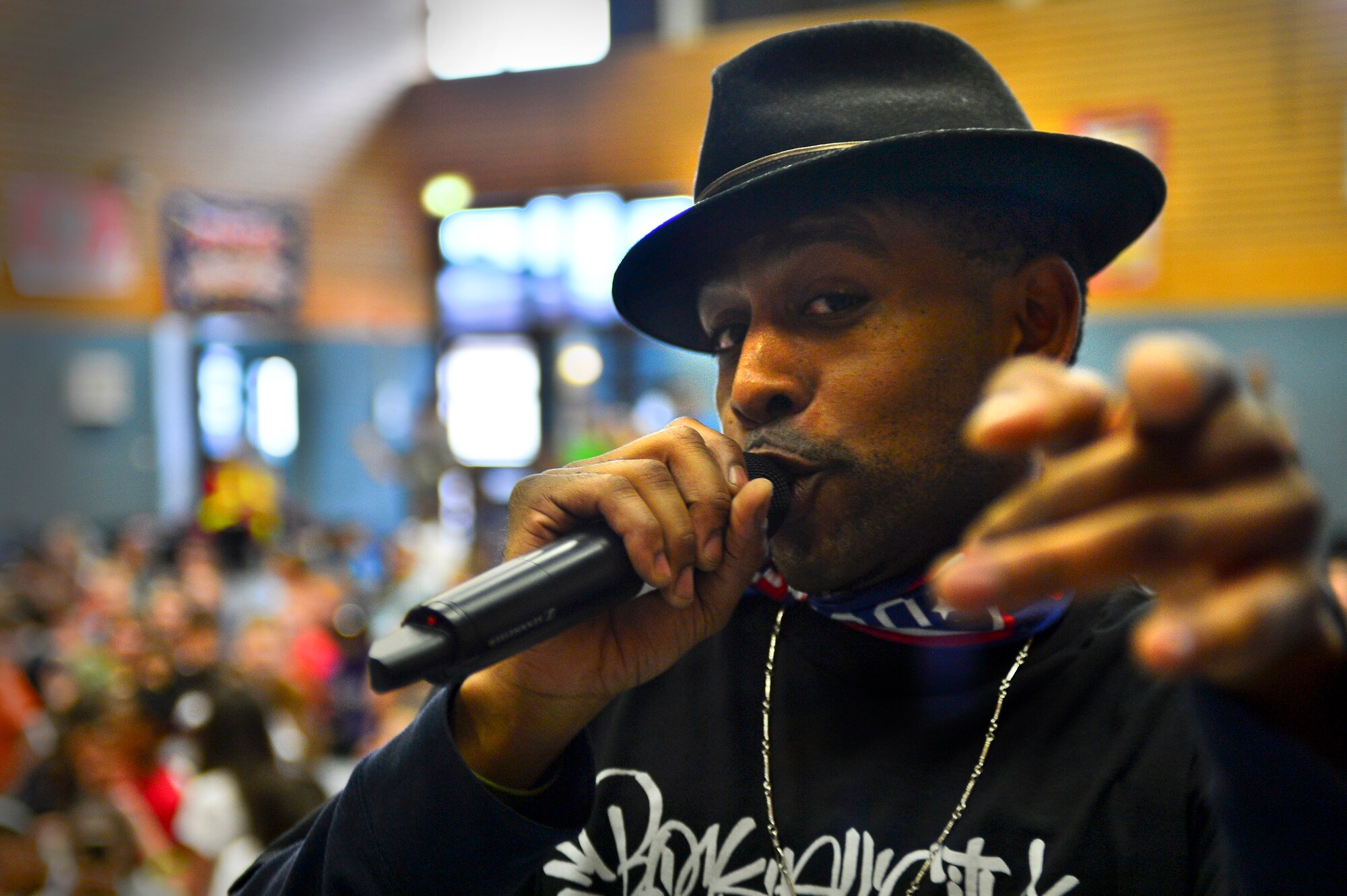 Dereck McKeith, musician, performs for students at Ramstein Middle School on Ramstein Air Base, Germany, May 21, 2013. The Traveling Guitar Foundation embarked on its first USO tour of Germany. (U.S. Air Force photo/Airman 1st Class Jordan Castelan)