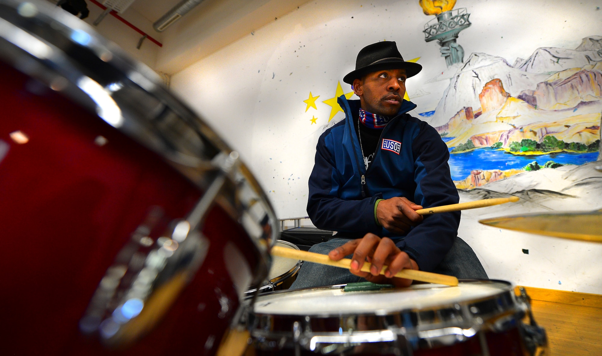 Dereck McKeith, musician, conducts a sound check before performing for students on Ramstein Air Base, Germany, May 21, 2013. The Traveling Guitar Foundation embarked on its first USO tour of Germany. (U.S. Air Force photo/Airman 1st Class Jordan Castelan)