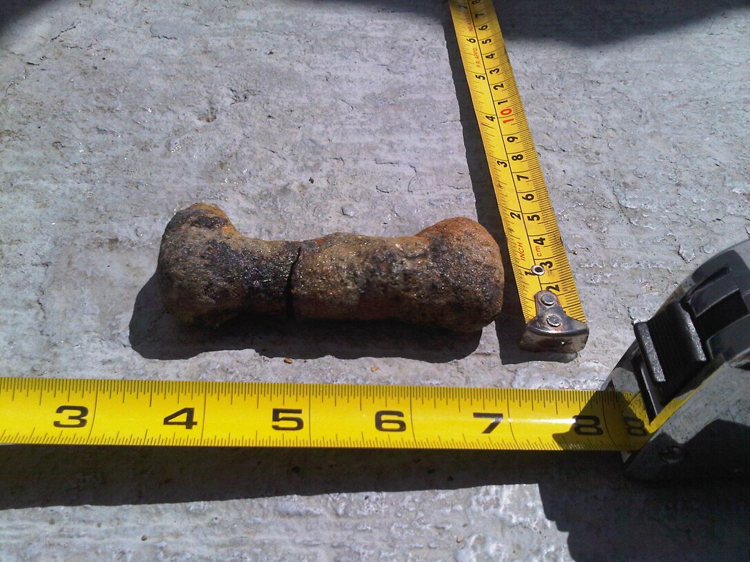 Unexploded ordnance, found by a young girl on Culebra, Puerto Rico. Old military munitions are not always easily identifiable and should always be considered dangerous, regardless of their age, condition or location. (Photo by responding explosives experts)