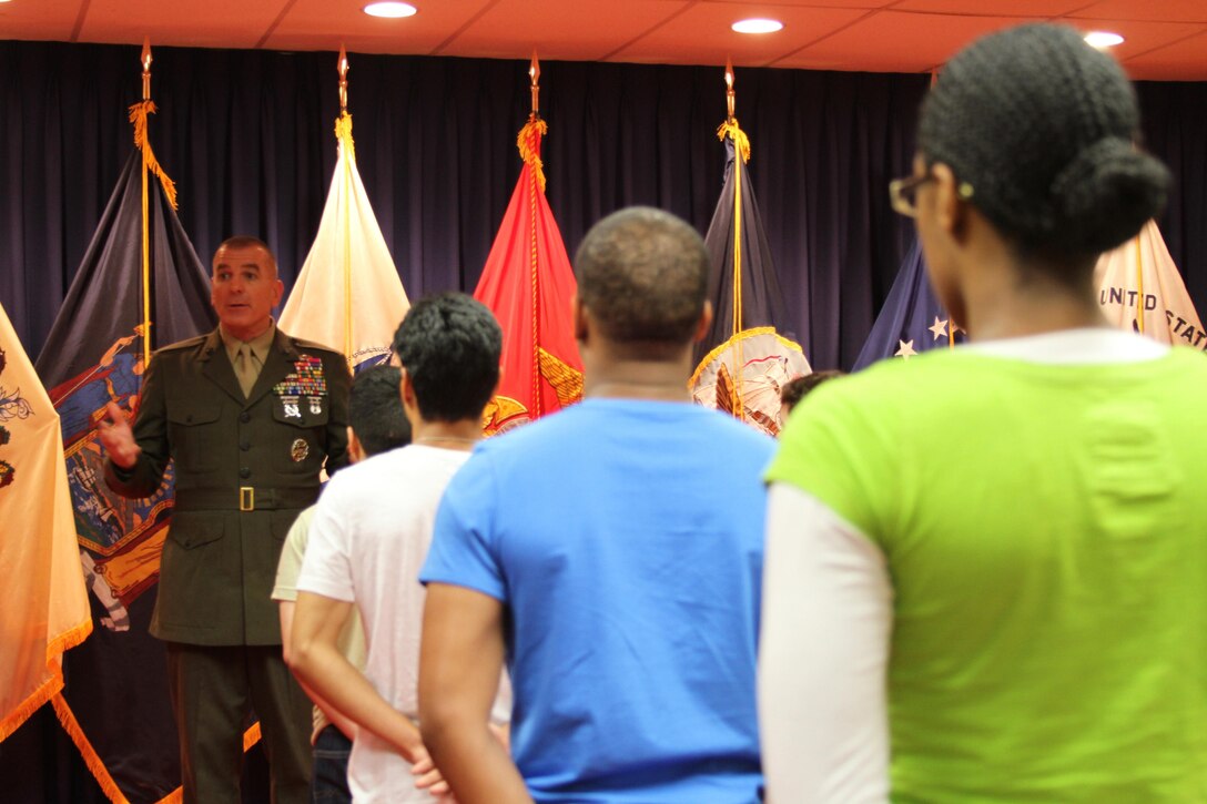 Sgt. Maj. Bryan B. Battaglia, the Senior Enlisted Advisor to Chairman of the Joint Chiefs of Staff, speaks to a group of applicants before administering the oath of enlistment at the Military Entrance Processing Station at Fort Hamilton in Brooklyn, N.Y., May 21.  The oath of enlistment is one of the first steps for young men and women entering the military.