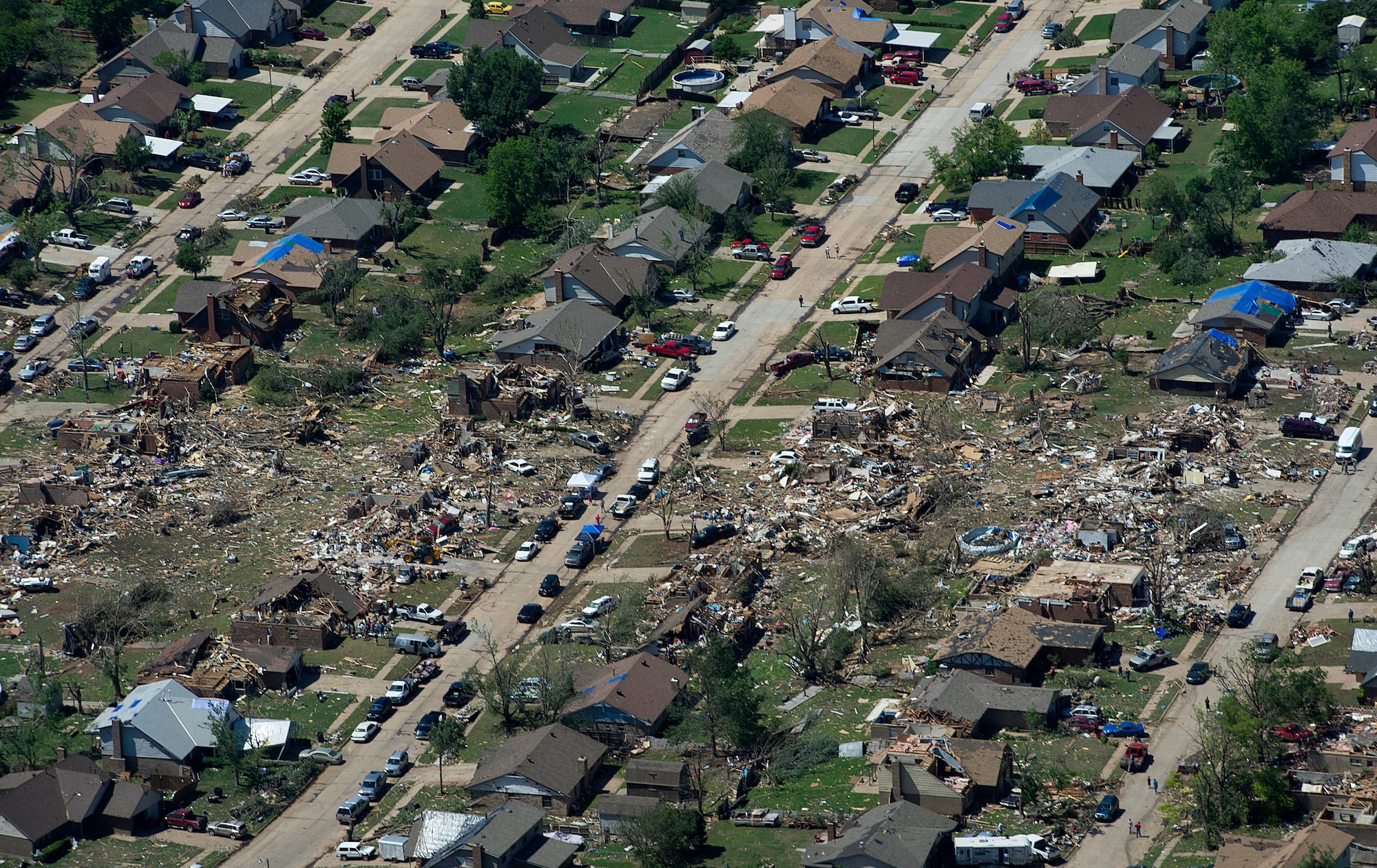 The path of a recent tornado in Moore, Okla., May 22, 2013. A tornado categorized as an EF5, the strongest category possible, with winds ranging from 200 to 210 mph struck Moore May 20, 2013. Oklahoma Insurance Department officials estimate nearly $2 billion in damage may have occurred in the affected areas. (U.S. Air Force photo/Tech. Sgt. Bradley C. Church)  