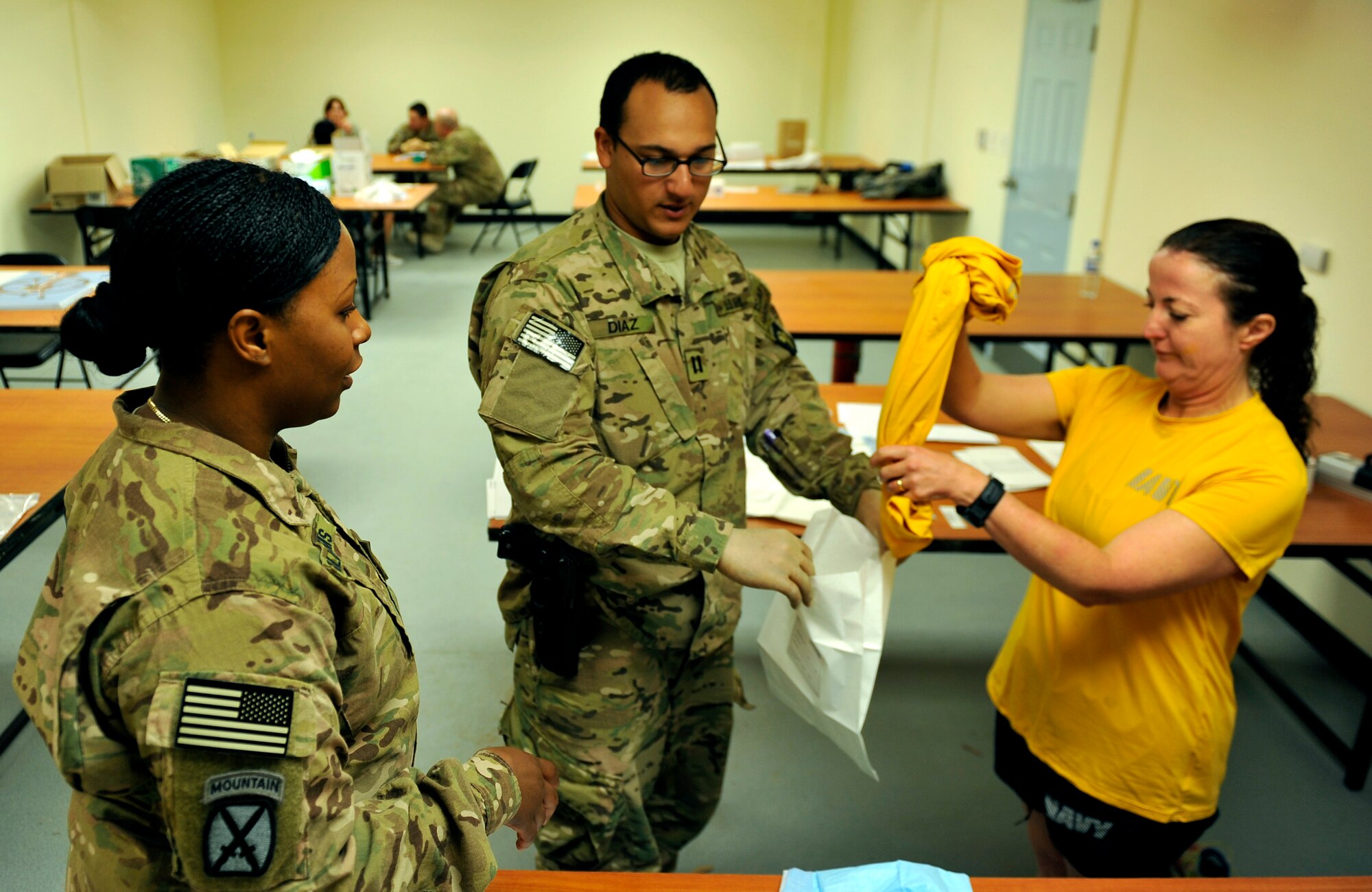 U.S. Army Maj. Alecia Wilson, Sexual Assault Forensic Examinations instructor, observes as Army Capt. Juan Diaz conducts an exam on a simulated patient on Bagram Airfield, Afghanistan, May 25, 2013. Diaz is a surgeon and he will be returning to his base in Afghanistan to be one of two SAFE-qualified providers. (U.S. Air Force photo/Staff Sgt. Stephenie Wade)