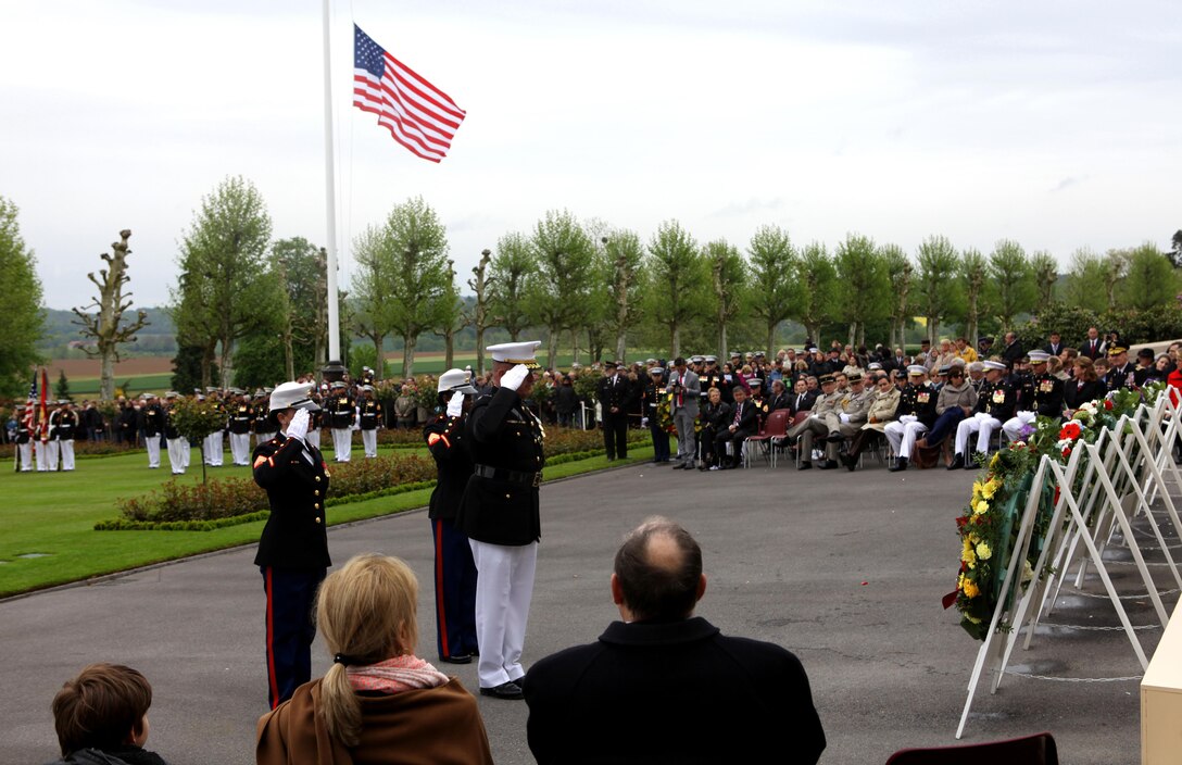 Major General Raymond C. Fox, commanding general of U.S. Marine Corps Forces Africa and II Marine Expeditionary Force, lays a wreathe in tribute and commemoration of the fallen troops for the Memorial Day event at Aisne-Marne American Cemetery, May 26. To celebrate Memorial Day, and to mark the 95th anniversary of the historic Battle of Belleau Wood, U.S. Marines with their French counterparts gathered at Aisne-Marne American Cemetery to commemorate their fallen heroes, May 26. The event was held in the memorial cemetery that lies outside of the historic grounds of Belleau Wood and featured the laying of wreathes, a firing of volleys, the playing of TAPS, raising of the American and French national colors, and a concert by the French military band. The mayor of the village of Bellau along with other military officers and officials representing the U.S. and France were present. Participating units from the U.S. Marines included 5th Marine Regiment, Marine Security Guard Detachment, the Wounded Warrior Regiment and Marine Forces Europe and Africa. French units that participated in the ceremony included the 21st Marine Infantry Regiment and the Musique Principale des Troupes de Marines. 

