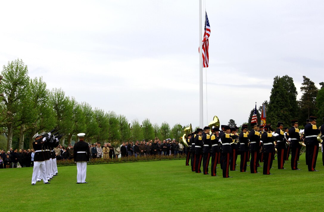 The firing-of-volleys by Marines from the 5th Marine Regiment during the Memorial Day ceremony at Aisne-Marne American Cemetery, May 26. To celebrate Memorial Day, and to mark the 95th anniversary of the historic Battle of Belleau Wood, U.S. Marines with their French counterparts gathered at Aisne-Marne American Cemetery to commemorate their fallen heroes, May 26. The event was held in the memorial cemetery that lies outside of the historic grounds of Belleau Wood and featured the laying of wreathes, a firing of volleys, the playing of TAPS, raising of the American and French national colors, and a concert by the French military band. The mayor of the village of Bellau along with other military officers and officials representing the U.S. and France were present. Participating units from the U.S. Marines included 5th Marine Regiment, Marine Security Guard Detachment, the Wounded Warrior Regiment and Marine Forces Europe and Africa. French units that participated in the ceremony included the 21st Marine Infantry Regiment and the Musique Principale des Troupes de Marines. 
