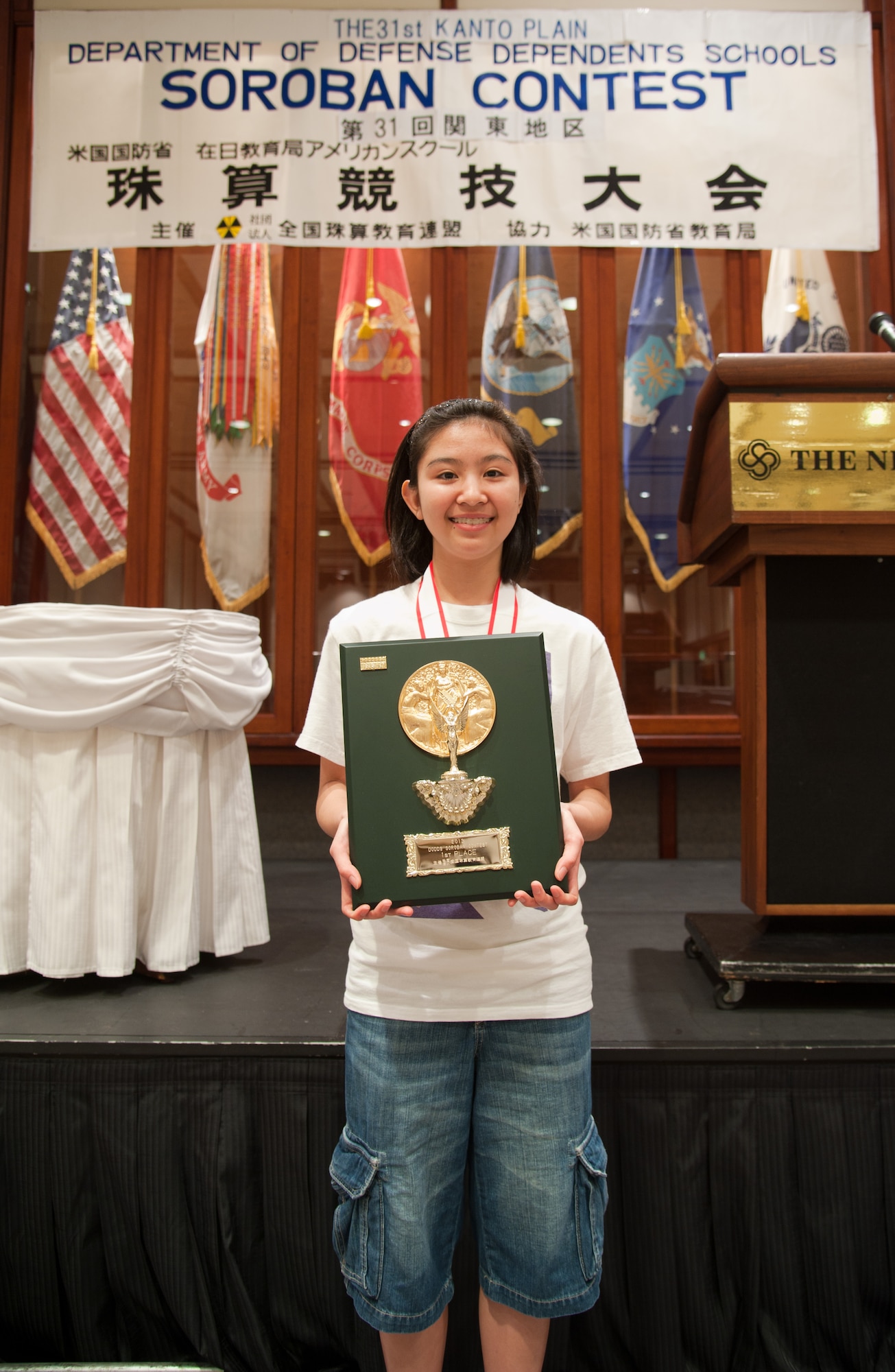 TOKYO, Japan – Kate Yamauchi, 14, a student from the Zama American Middle School, poses for a photo with her award at the New Sanno Hotel, Japan, May 16, 2013.  Yamauchi received the highest score for the second year in a row at the annual Soroban Contest.  (U.S. Air Force photo by Airman 1st Class Soo C. Kim)