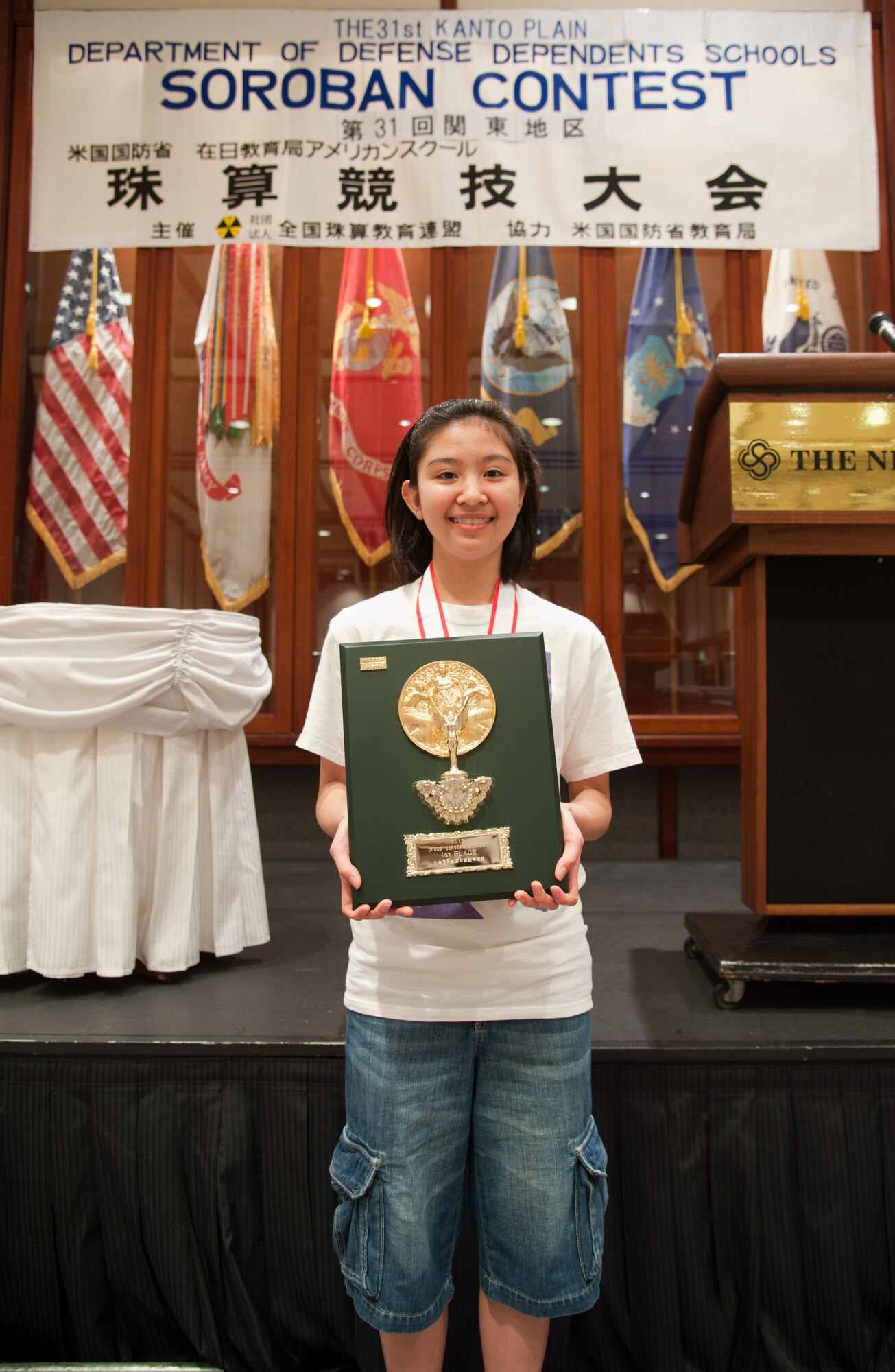 TOKYO, Japan – A student solves a math equation at the 31st Soroban Contest at the New Sanno Hotel, Japan, May 16, 2013.  In this competition, students used Sorobans, Japanese abacuses, to find the answer.  (U.S. Air Force photo by Airman 1st Class Soo C. Kim)