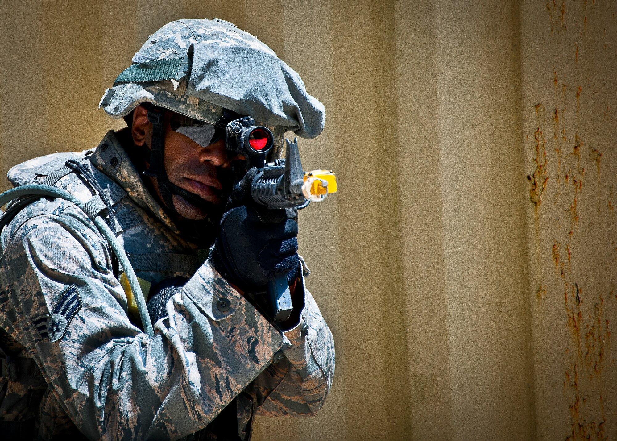 Senior Airman William Whitlow, of the 164th Security Forces Squadron, scans the area along the roadside during the three-day Brave Defender field training exercise May 20 at Eglin Air Force Base, Fla.  The exercise is the culmination of Air Force Materiel Command’s six-week security forces deployment training, administered by the 96th Ground Combat Training Squadron. GCTS instructors teach 10 training classes a year, which consists of improvised explosive device detection and reaction, operating in an urban environment, mission planning, land navigation and casualty care and more. More than 140 active-duty and National Guard Airmen attended this training. (U.S. Air Force photo/Samuel King Jr.)