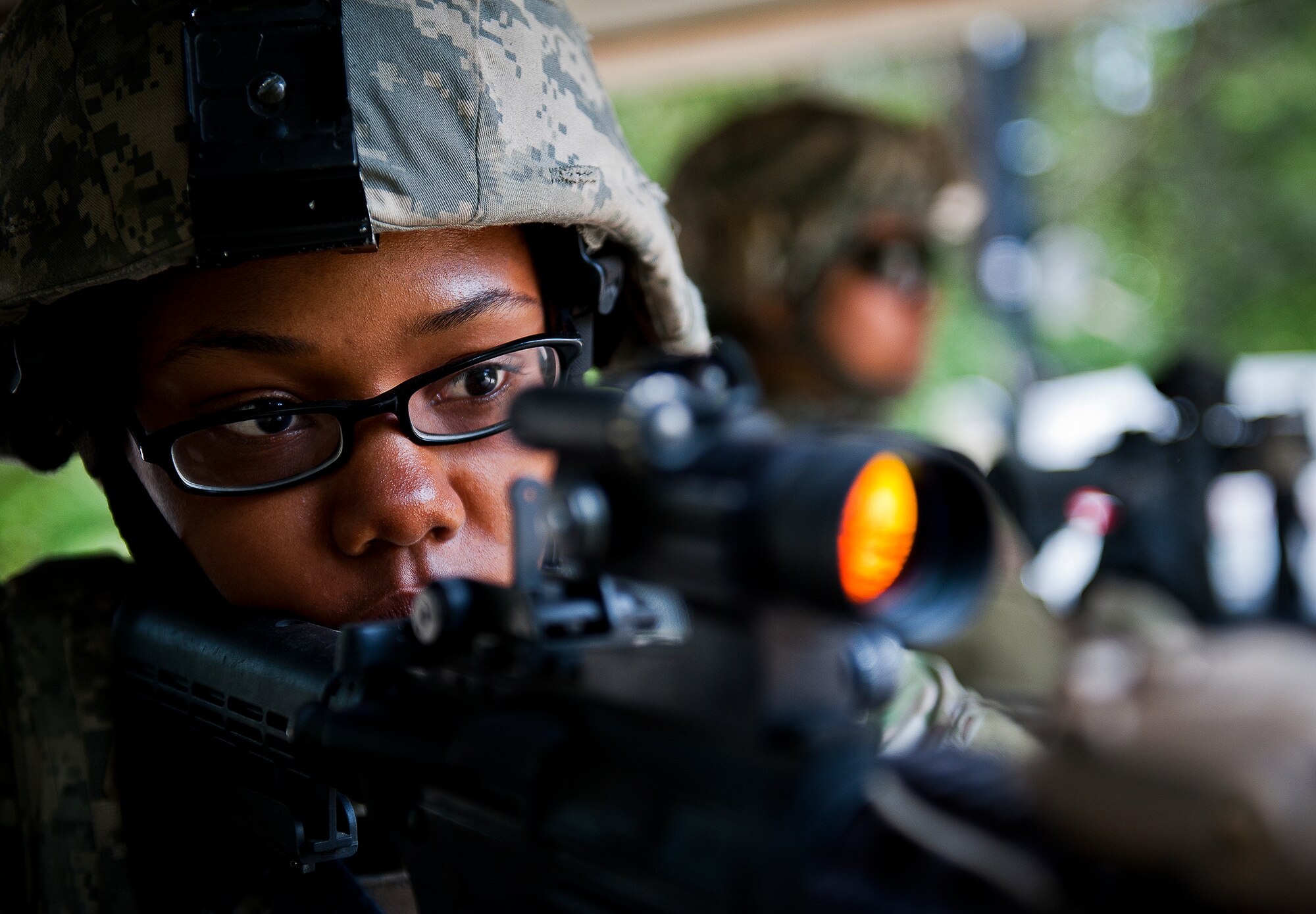 Senior Airman India Brown, of the 94th Security Forces Squadron, stands guard at her post at the Base Tango entry control point during the three-day Brave Defender field training exercise May 19 at Eglin Air Force Base, Fla.  The exercise is the culmination of Air Force Materiel Command’s six-week security forces deployment training, administered by the 96th Ground Combat Training Squadron. GCTS instructors teach 10 training classes a year, which consists of improvised explosive device detection and reaction, operating in an urban environment, mission planning, land navigation and casualty care and more. More than 140 active-duty and National Guard Airmen attended this training. (U.S. Air Force photo/Samuel King Jr.)