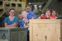 Family members of Marines and sailors with Retrograde and Redeployment in support of Reset and Reconstitution Operations Group, or R4OG, 2nd Marine Logistics Group watch their loved ones depart to Afghanistan on a deployment aboard Camp Lejeune, N.C., May 16, 2013. Families and friends came to Camp Lejeune to bid farewell to more than 100 reservists and 50 active duty service members, who embarked on a seven-month deployment. 