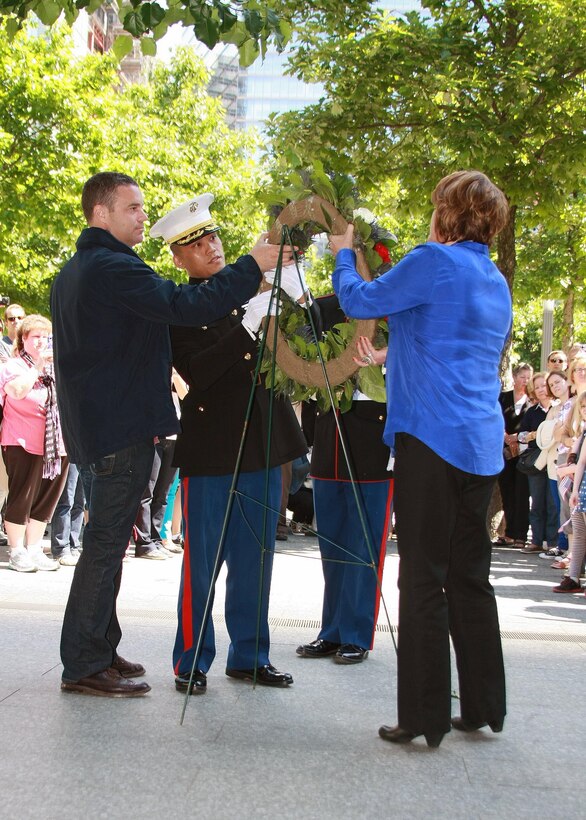 NEW YORK -- Joe Daniels, president of the National September 11 Memorial and Museum, Maj. Arlan Della, the 1st Marine Corps District logistics officer, and Carolyn Brown, the sister of FDNY Capt. Patrick Brown, who died on Sept. 11, 2001, lay a wreath May 27 at the National September 11 Memorial and Museum.  The wreath was laid in honor of Memorial Day and to honor those fallen during the attacks on the World Trade Center.  (U.S. Marine Corps photo by Staff Sgt. Juan Vara).
