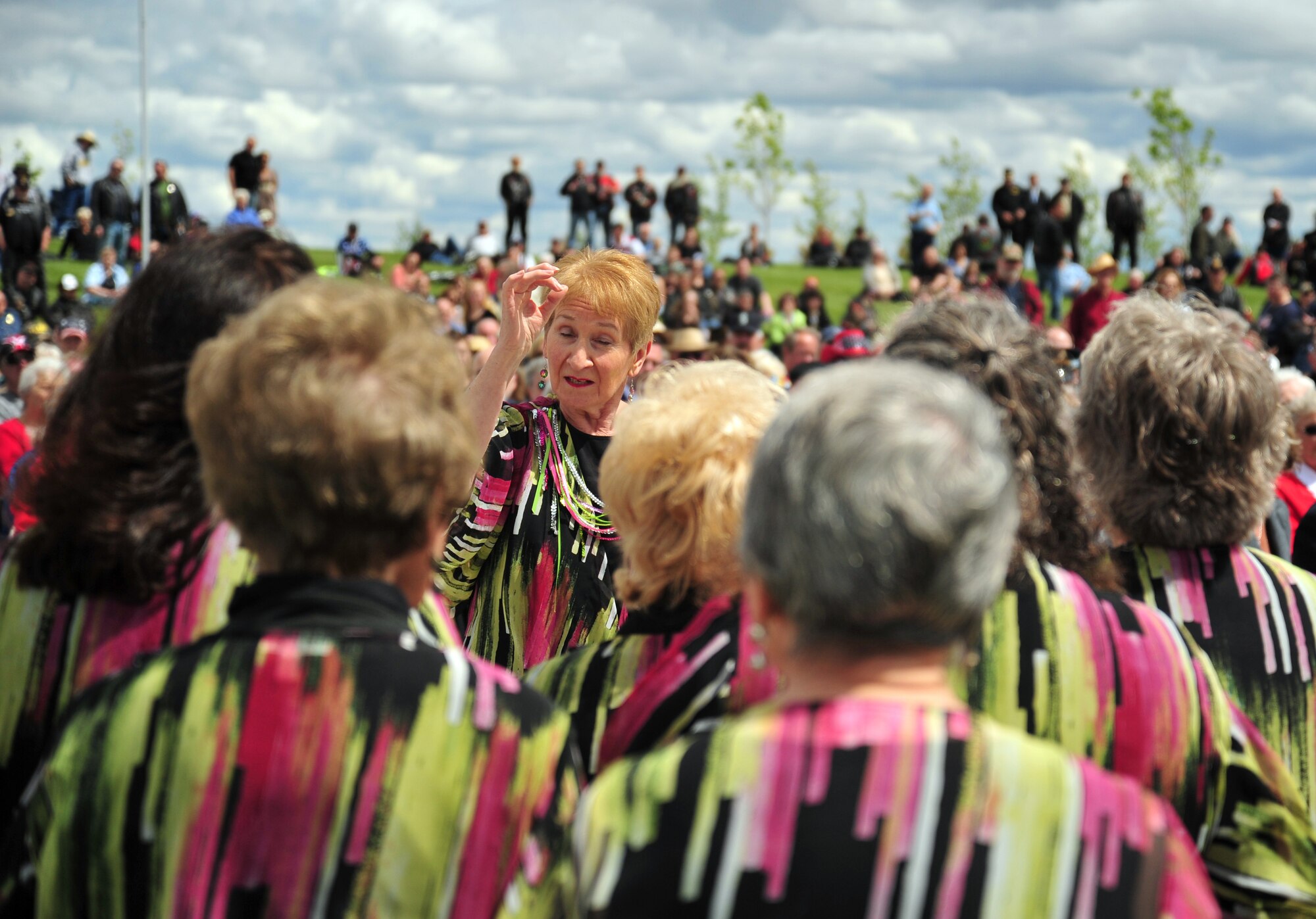 The Rivers Edge Chorus performs during the Washington Department of Veteran Affairs Memorial Day Ceremony at the Washington State Veteran’s Cemetery, Medical Lake, Wash., May 27, 2013. The team sang the official songs of each military branch. (U.S. Air Force photo by Senior Airman Taylor Curry/Released)