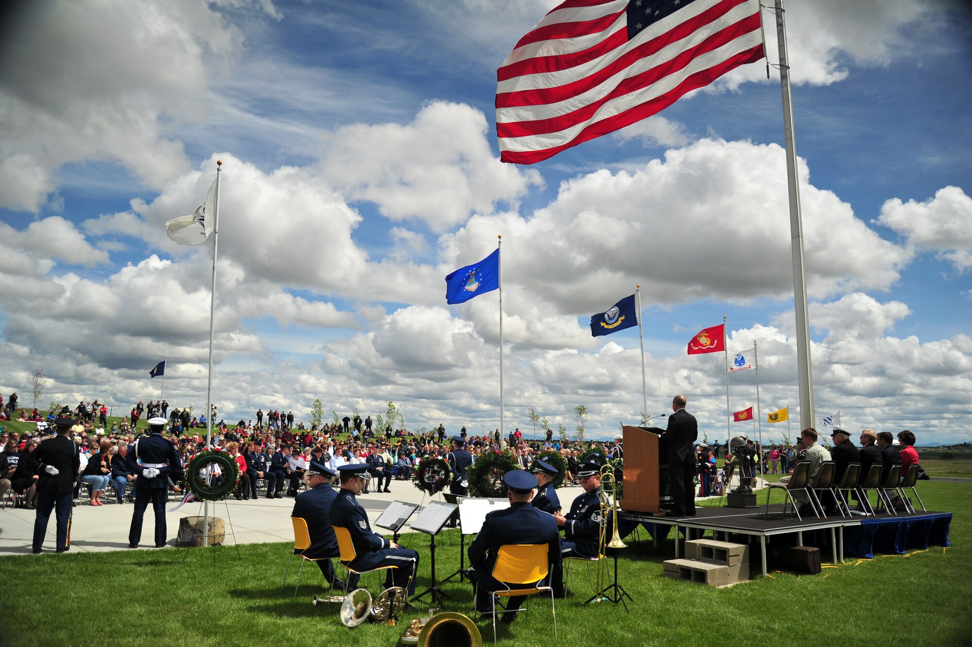 Members of the community gather for the Washington Department of Veteran Affairs Memorial Day Ceremony at the Washington State Veteran’s Cemetery, Medical Lake, Wash., May 27, 2013. Guest speakers included Congresswoman Cathy McMorris Rodgers, Mayor of Spokane David Condon and former Navy corpsman Dick Gruell. (U.S. Air Force photo by Senior Airman Taylor Curry/Released) 