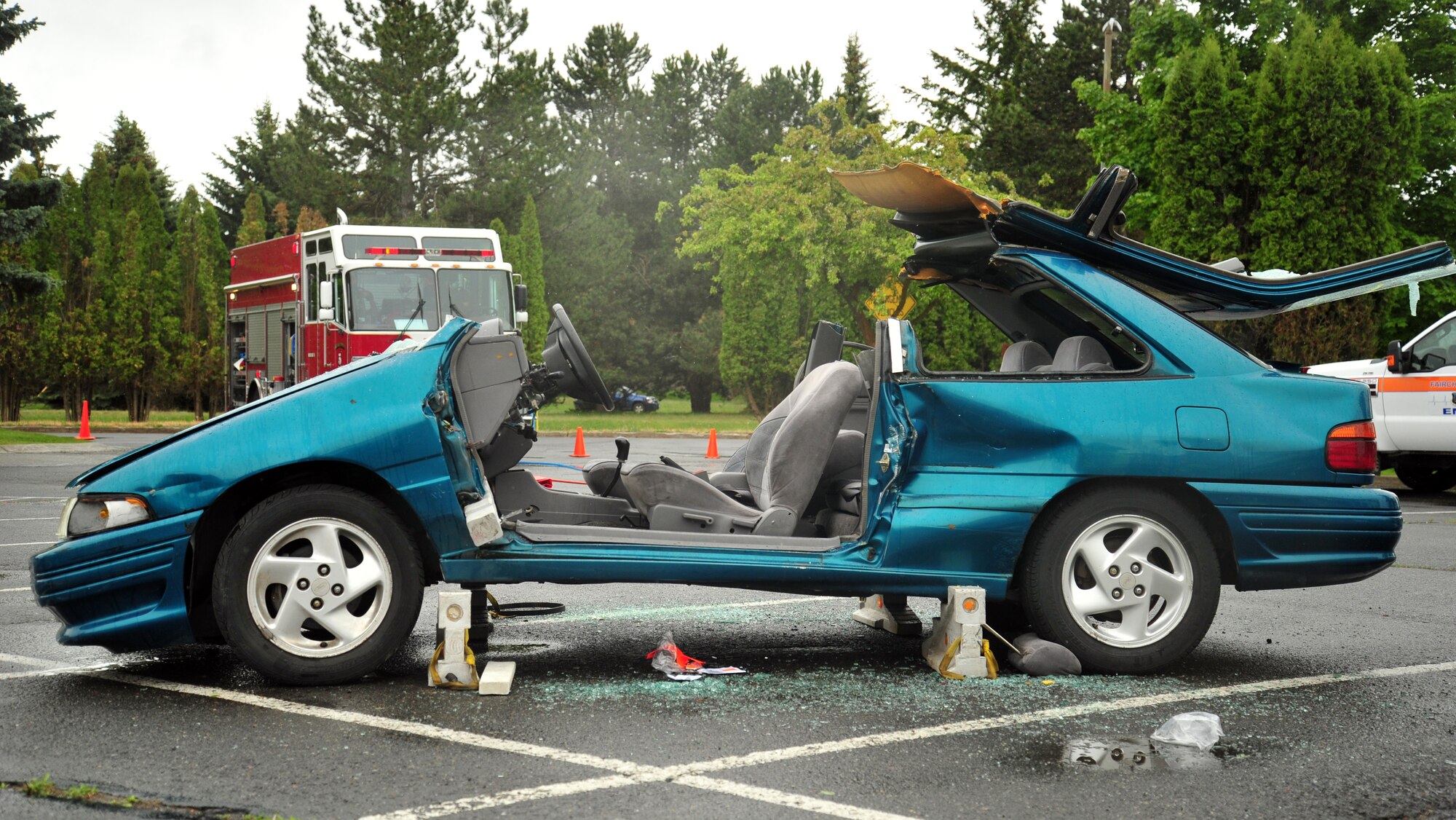 A vehicle demolished by 92nd Civil Engineer Squadron firefighters using the “Jaws of Life” during a demonstration at Fairchild Air Force Base, Wash., May 22, 2013. Jaws of Life are hydraulic rescue tools used by emergency rescue personnel to assist extraction of automobile accident victims. (U.S. Air Force photo by Senior Airman Taylor Curry/Released)