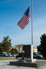 The U.S. Flag sits at half- staff before a National Police Week memorial retreat at Kunsan Air Base, Republic of Korea, May 15, 2013. The retreat was in honor of security personnel who have fallen in the line of duty. (U.S. Air Force photo by Staff Sgt. Jonathan Fowler/Released)