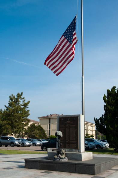The U.S. Flag sits at half- staff before a National Police Week memorial retreat at Kunsan Air Base, Republic of Korea, May 15, 2013. The retreat was in honor of security personnel who have fallen in the line of duty. (U.S. Air Force photo by Staff Sgt. Jonathan Fowler/Released)