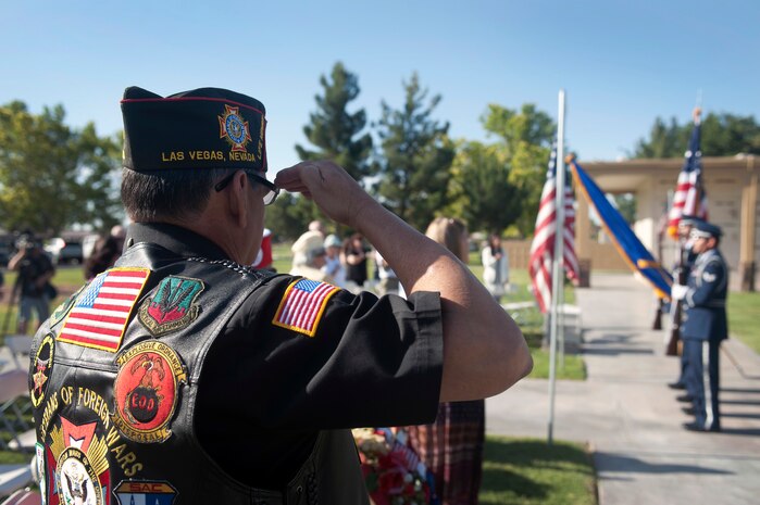 Mr. Doug Meroney, Veterans of Foreign Wars Nevada District 6 commander, salutes the flag during a Memorial Day ceremony May 27, 2013, at the Bunkers Memory Gardens Cemetery in Las Vegas. During the ceremony Sen. Dean Heller, from Nevada’s Congressional 2nd District, and local community members took time to pay tribute to service members who have served in the military and lost their lives during one of the nation’s past conflicts. (U.S. Air Force photo by Staff Sgt. Michael Charles)