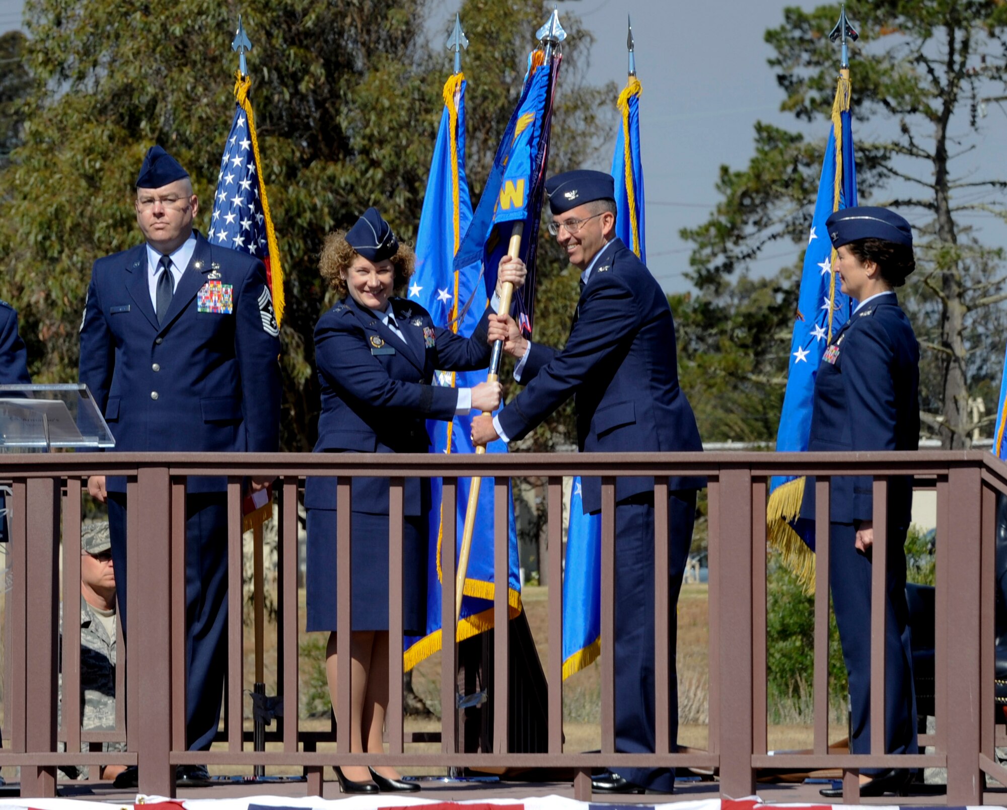 VANDENBERG AIR FORCE BASE, Calif. – VANDENBERG AIR FORCE BASE, Calif. – Lt. Gen. Susan Helms, commander of U.S. Strategic Command’s Joint Functional Component Command for Space and 14th Air Force (Air Forces Strategic), gives the 30th SW guide-on to Col. Keith Balts, 30th Space Wing commander, during a change-of-command here Tuesday, May 28, 2013. Balts took command of the 30th SW at the ceremony from the former 30th SW commander, Col. Nina Armagno. (U.S. Air Force photo/Senior Airman Lael Huss)