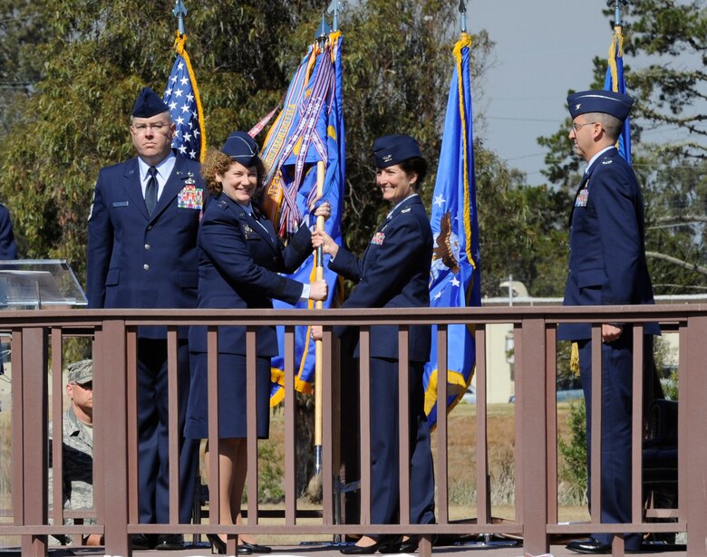 VANDENBERG AIR FORCE BASE, Calif. – VANDENBERG AIR FORCE BASE, Calif. – Lt. Gen. Susan Helms, commander of U.S. Strategic Command’s Joint Functional Component Command for Space and 14th Air Force (Air Forces Strategic), accepts the 30th SW guideon from Col. Nina Armagno, 30th Space Wing former commander, during a change-of-command here Tuesday, May 28, 2013. Col. Keith Balts took command of the 30th SW at the ceremony from the former 30th SW commander, Armagno. (U.S. Air Force photo/Senior Airman Lael Huss)