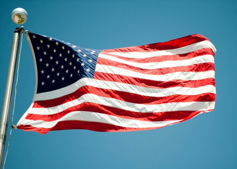 The U.S. flag is shown waving during a Memorial Day ceremony at Holloman Air Force Base, N.M., May 22. Memorial Day is a day of remembering the men and women who died while serving in the United States Armed Forces. Formerly known as Decoration Day, it originated after the American Civil War to commemorate the Union and Confederate soldiers who died in the Civil War. (U.S. Air Force photo by Airman 1st Class Daniel E. Liddicoet/Released)
