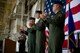 U.S. Air Force Airmen sing the Air Force song during a change of command ceremony May 23, 2013, at Dyess Air Force Base, Texas. The ceremony is a military tradition deeply rooted in history and dates back to the times of the Roman Legion. In that period, military organizations developed flags that were unique to the organization with specialized colors and designs. When the soldiers followed their leaders into battle, they kept sight of the flag. If the banner still waved after the conflict, it was a sign that their side had won. Having this position of importance, the flag was incorporated into the change of command ceremonies. The organizational banner was exchanged in public for all to see that the one who holds the flag is the unchallenged leader of the armies. The modern day ceremony is principally symbolic, yet it still indicates to all the authority of the incoming commander in the finest military traditions. The outgoing commander surrenders the flag and says, “Sir, I relinquish the command.” The flag is then passed to the new commander who says, “Sir, I accept the command.” (U.S. Air Force photo by Airman 1st Class Damon Kasberg/Released) 