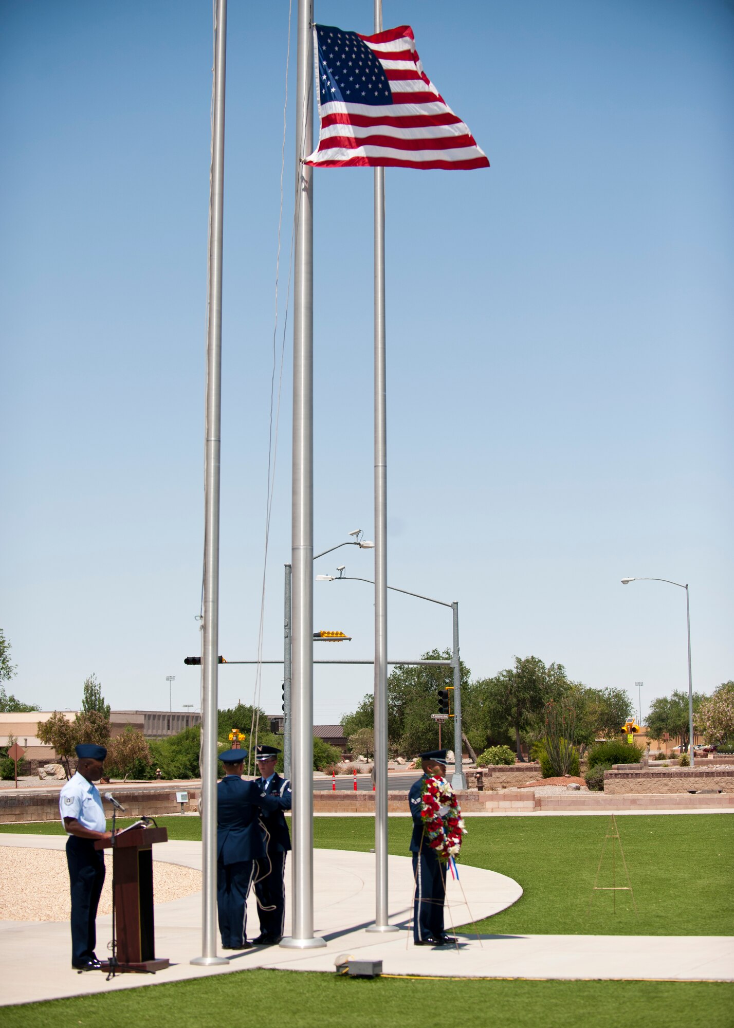 The Steel Talons Honor Guard raises the U.S.  flag during a Memorial Day ceremony at Holloman Air Force Base, N.M., May 22. Memorial Day is a day of remembering the men and women who died while serving in the United States Armed Forces. Formerly known as Decoration Day, it originated after the American Civil War to commemorate the Union and Confederate soldiers who died in the Civil War. (U.S. Air Force photo by Airman 1st Class Daniel E. Liddicoet/Released)

