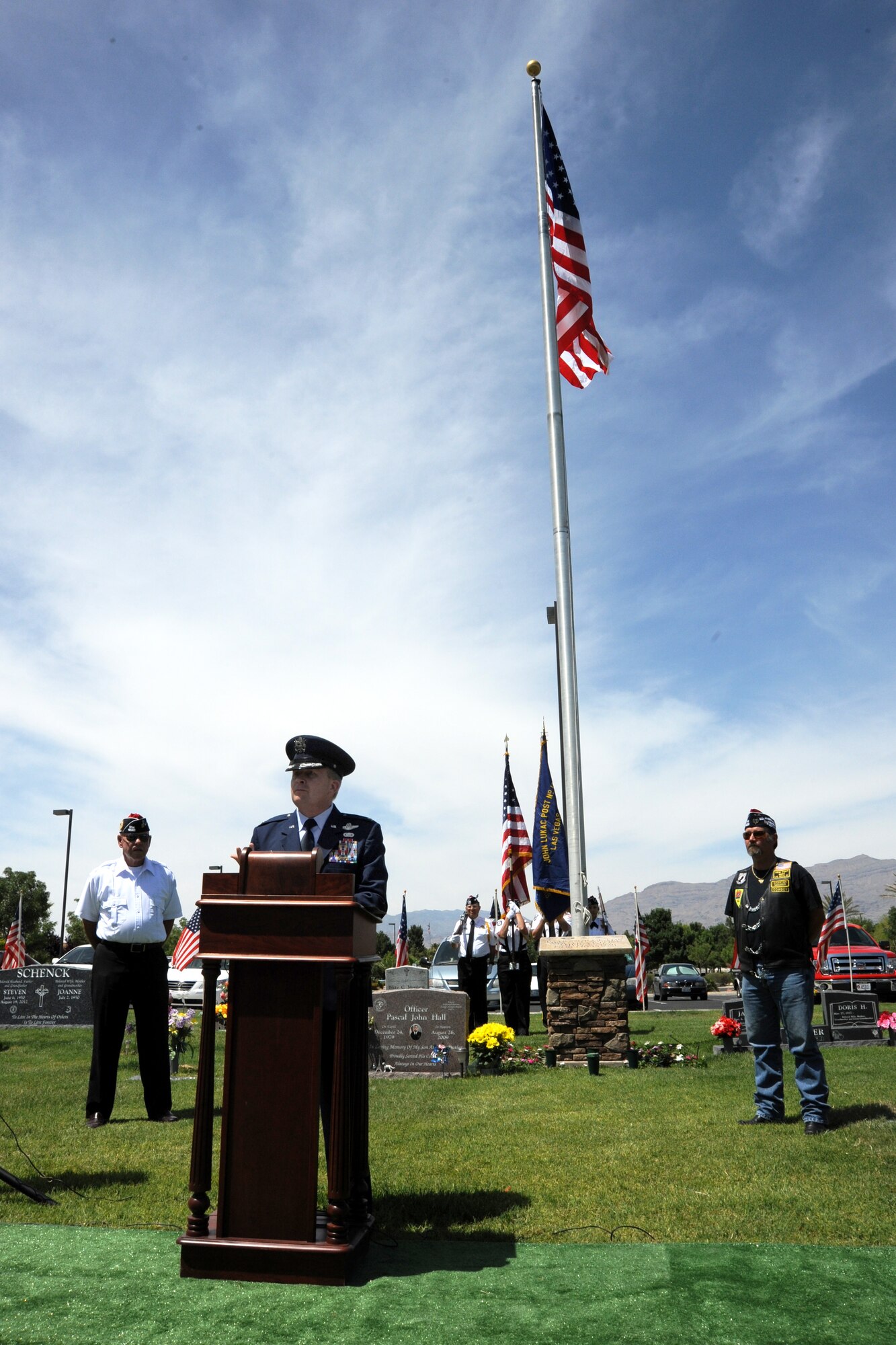 LAS VEGAS, Nev. -- Col. Jim Cluff, 432nd Wing and 432nd Air Expeditionary Wing commander, speaks at a Memorial Day ceremony hosted by the Veterans of Foreign Wars, Post 12093, May 27, 2013.  The ceremony took place to honor the men and women from all branches of the U.S. military who have paid the ultimate sacrifice in support of American freedoms. (U.S. Air Force photo by 1st Lt. S.S./Released)
