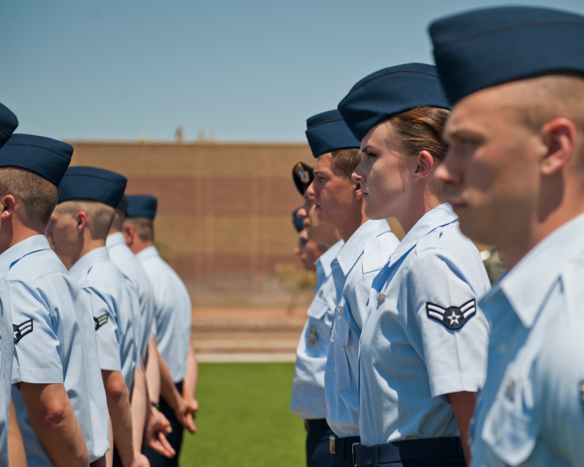 Members of Team Holloman stand in formation at Holloman Air Force Base, N.M., May 22. Memorial Day is a day of remembering the men and women who died while serving in the United States Armed Forces. Formerly known as Decoration Day, it originated after the American Civil War to commemorate the Union and Confederate soldiers who died in the Civil War. (U.S. Air Force photo by Airman 1st Class Daniel E. Liddicoet/Released)
