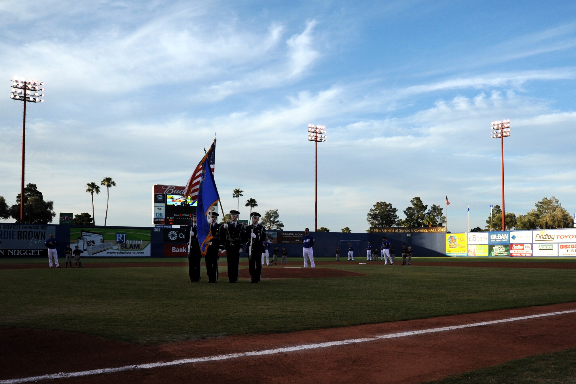 LAS VEGAS, Nev. -- The Nellis Air Force Base Honor Guard presents the colors before a Las Vegas 51s baseball game at Cashman Field May 24, 2013. The minor league team hosted a military appreciation night in honor of U.S. military members and their families to kick off the beginning of the summer season. (U.S. Air Force photo by 1st Lt. S.S./Released)