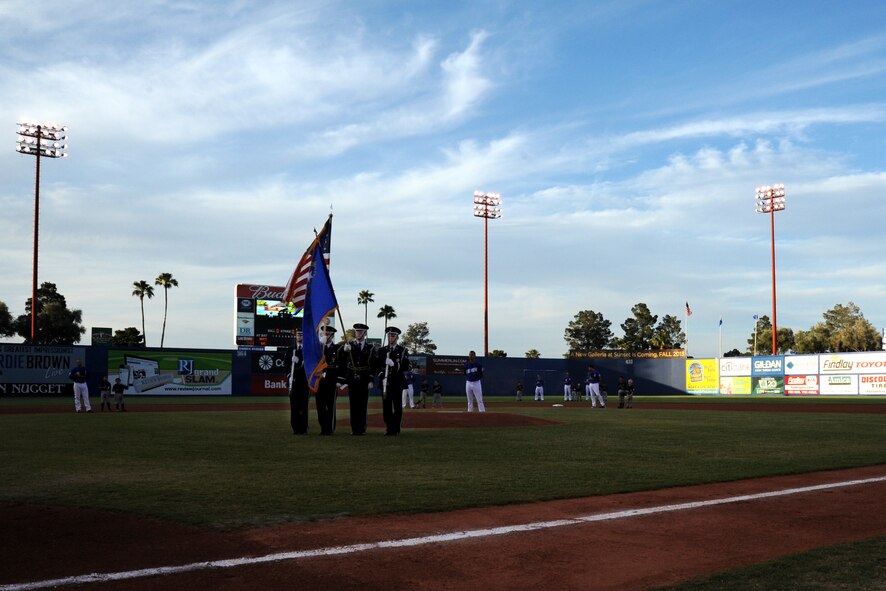 LAS VEGAS, Nev. -- The Nellis Air Force Base Honor Guard presents the colors before a Las Vegas 51s baseball game at Cashman Field May 24, 2013. The minor league team hosted a military appreciation night in honor of U.S. military members and their families to kick off the beginning of the summer season. (U.S. Air Force photo by 1st Lt. S.S./Released)