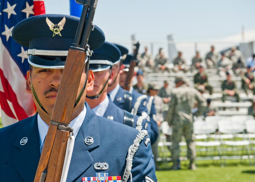 Members of the Steel Talons Honor Guard prepare to post colors during a Memorial Day ceremony at Holloman Air Force Base, N.M., May 22. Memorial Day is a day of remembering the men and women who died while serving in the United States Armed Forces. Formerly known as Decoration Day, it originated after the American Civil War to commemorate the Union and Confederate soldiers who died in the Civil War. (U.S. Air Force photo by Airman 1st Class Daniel E. Liddicoet/Released)