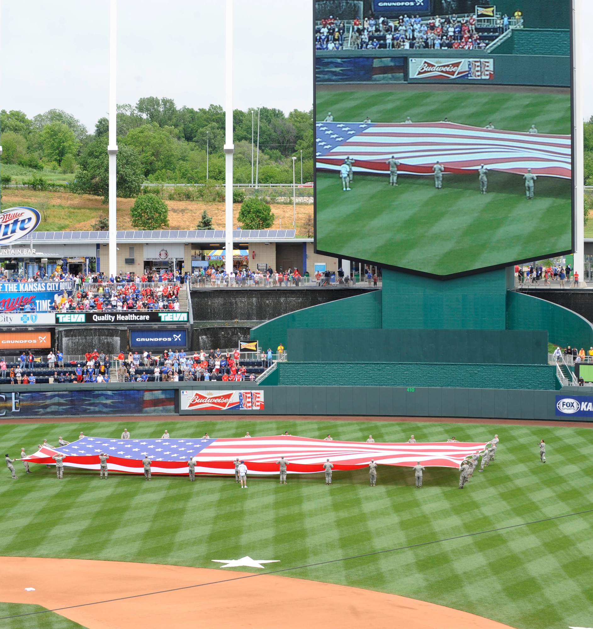 The Kansas City Royals honor the military during Armed Forces Day, May 27, 2013, at Kauffman Stadium in Kansas City, Mo., before a game against the St. Louis Cardinals. Thirty Airmen from Whiteman Air Force Base, Mo., displayed the flag during the special pregame ceremony. (U.S. Air Force photo by Staff Sgt. Alexandra M. Boutte/Released)