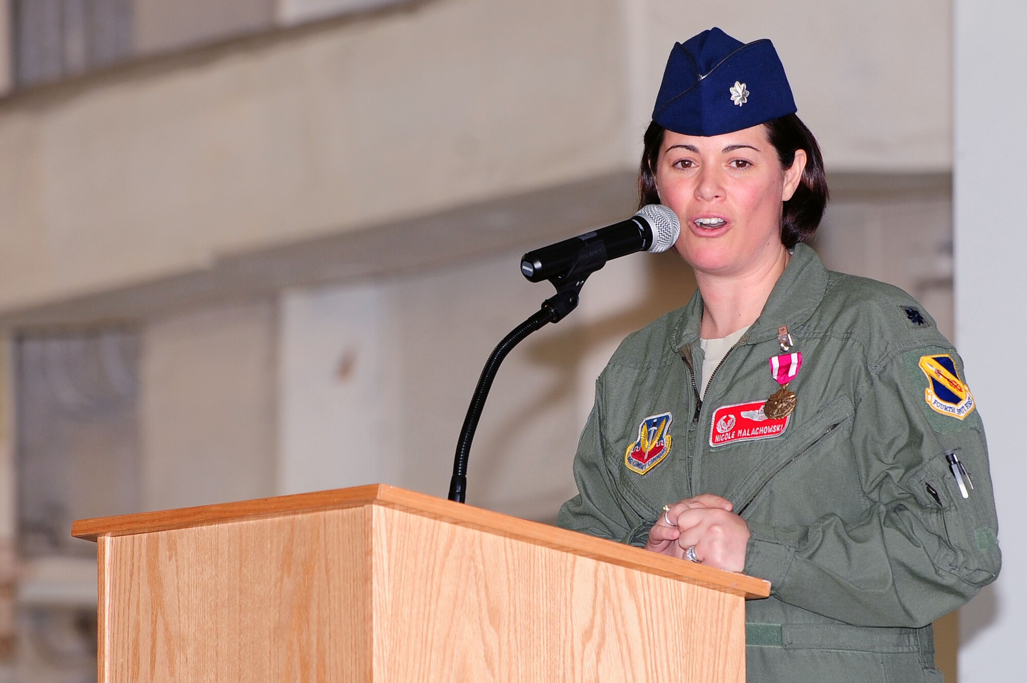 U.S. Air Force Lt. Col. Nicole Malachowski, 333rd Fighter Squadron out-going commander, addresses her special guests in the audience at a change of command ceremony at Seymour Johnson Air Force Base, N.C., May 17, 2013.  Malachowski has served as the commander of the 333rd FS since Nov. 18, 2011.  (U.S. Air Force photo by Airman 1st Class John Nieves Camacho/Released)