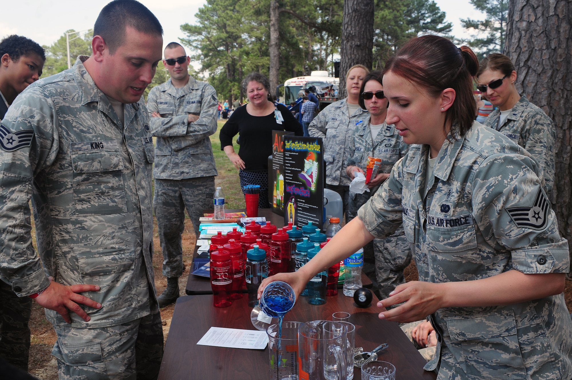 U.S. Air Force Staff Sgt. Vanessa Dale, 4th Medical Operations Squadron mental health technician, explains alcoholic drinking levels during the 4th Fighter Wing’s inaugural Comprehensive Airmen Fitness (CAF) day at Seymour Johnson Air Force Base, N.C., May 17, 2013. The CAF day began with a wing run and finished with a base-wide picnic. (U.S. Air Force photo by Airman 1st Class John Nieves Camacho/Released)
